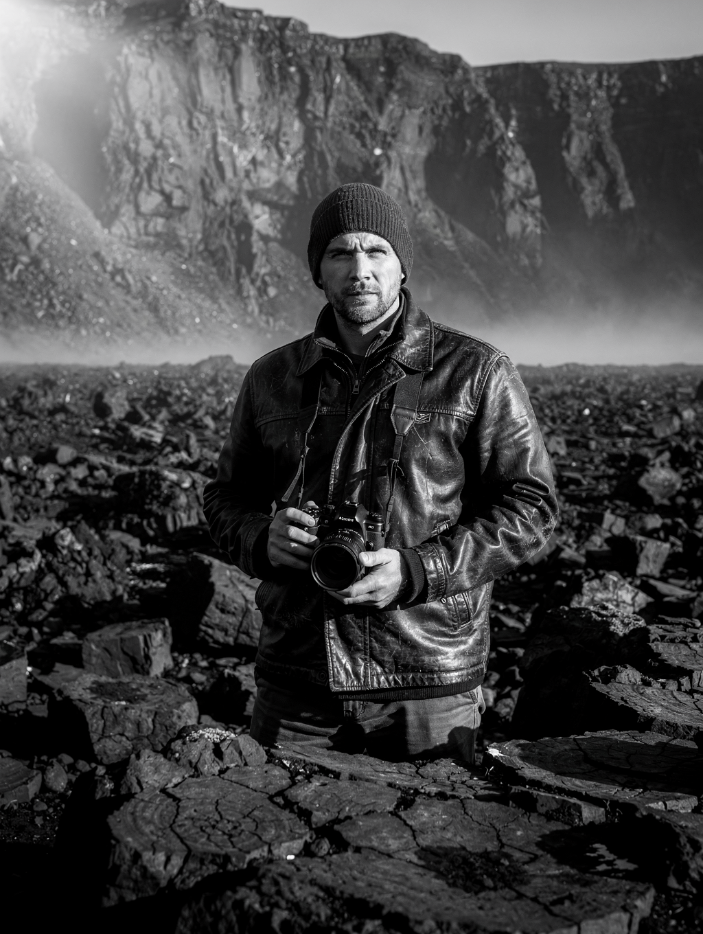 Landscape photographer documenting glacial peaks in Iceland